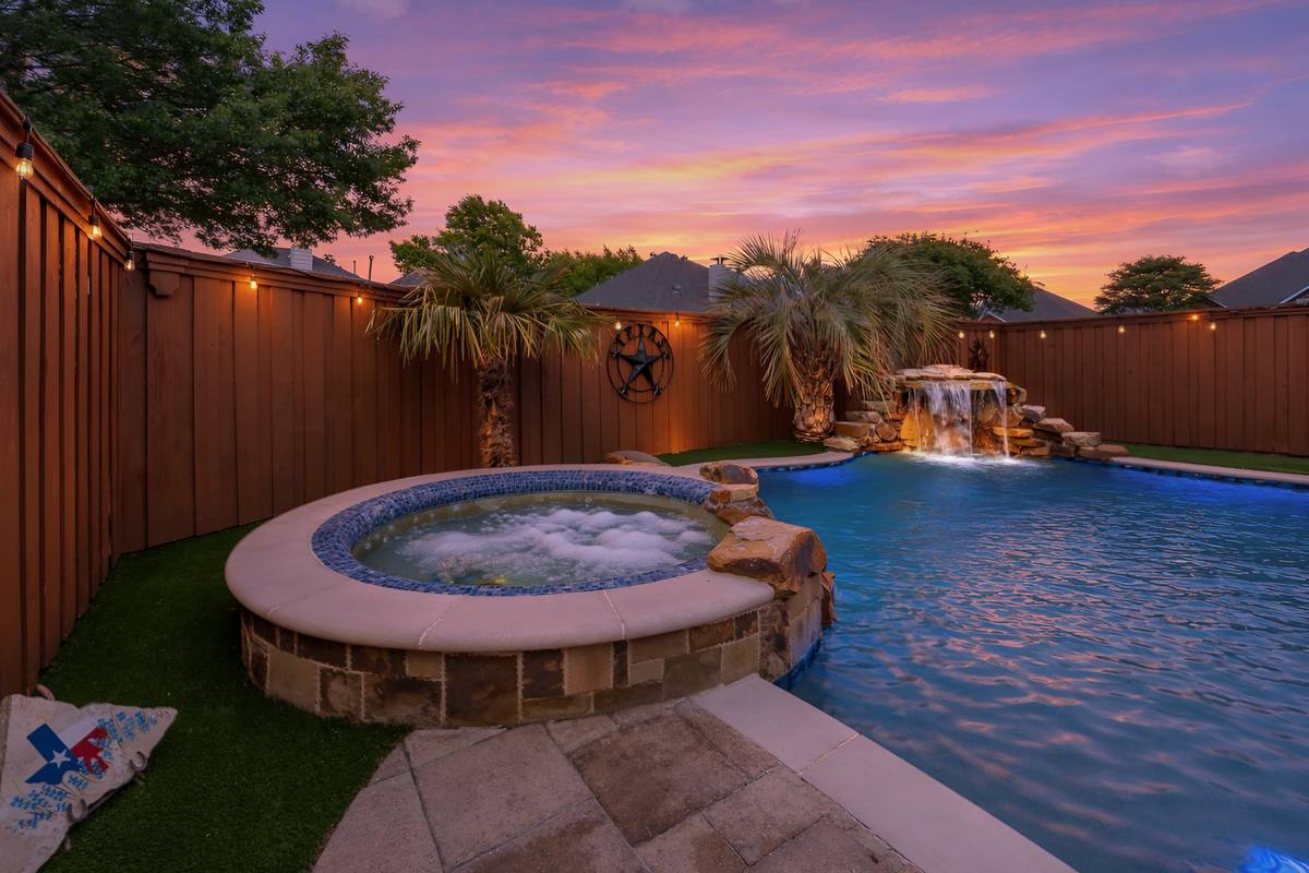 The Indigo Oasis Backyard & Pool – Backyard Pool Dusk 1