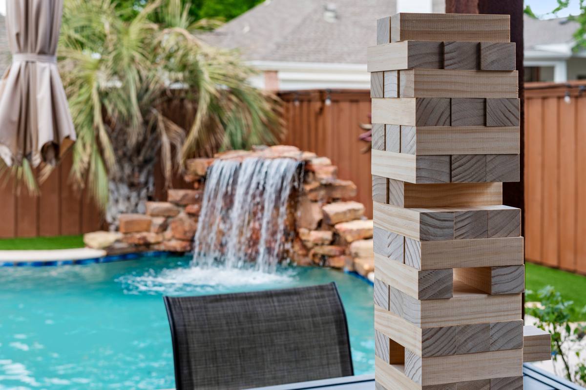 The Indigo Oasis Backyard & Pool – Pool Game Jenga 1