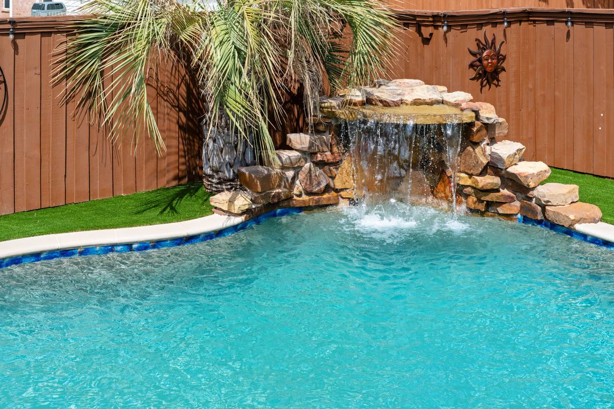 The Indigo Oasis Backyard & Pool – Pool Waterfall 1