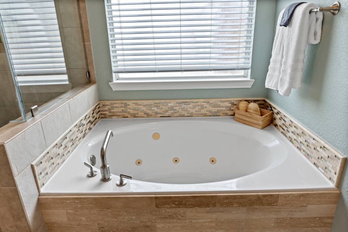 The Indigo Oasis Primary Bathroom – Primary Bathroom Tub 1